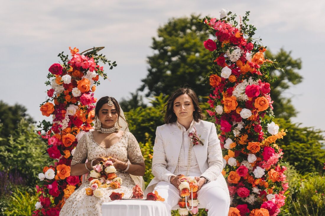 LGBTQ wedding photographer outdoor hindu wedding ceremony at How Caple Court