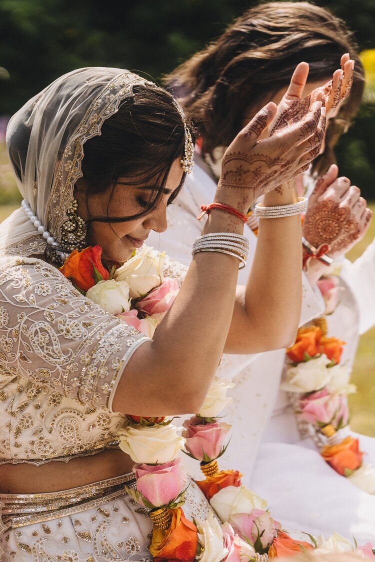 LGBTQ wedding photographer outdoor hindu wedding ceremony at How Caple Court