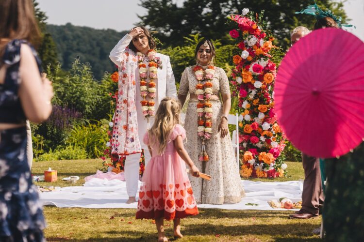LGBTQ wedding photographer outdoor hindu wedding ceremony at How Caple Court