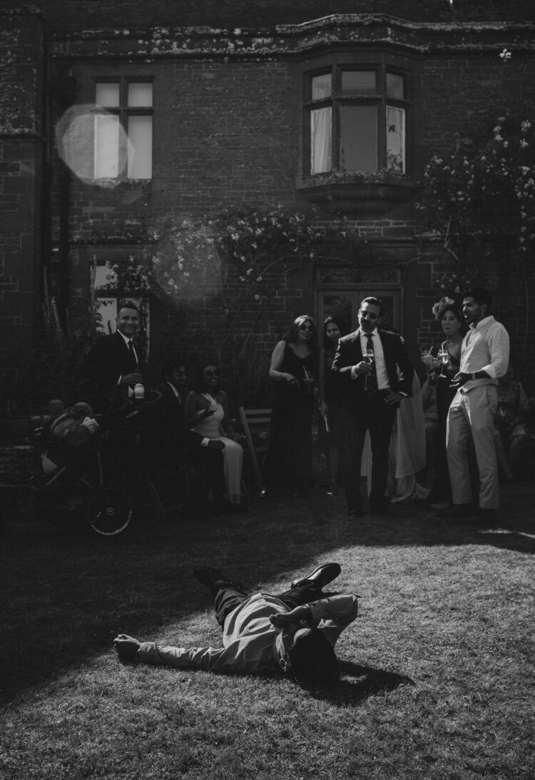 guests enjoying reception drinks at How Caple Court wedding venue in Herefordshire