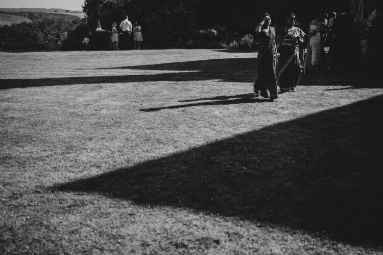 guests enjoying reception drinks at How Caple Court wedding venue in Herefordshire