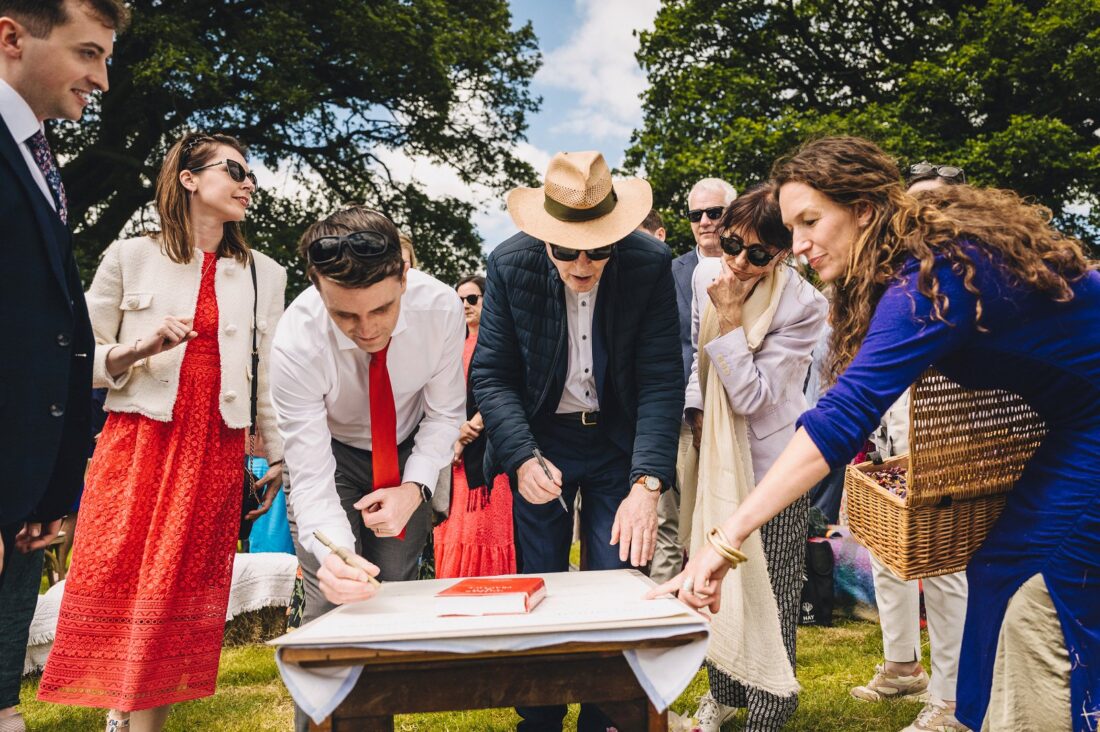 signing the quaker wedding ceremony certificate