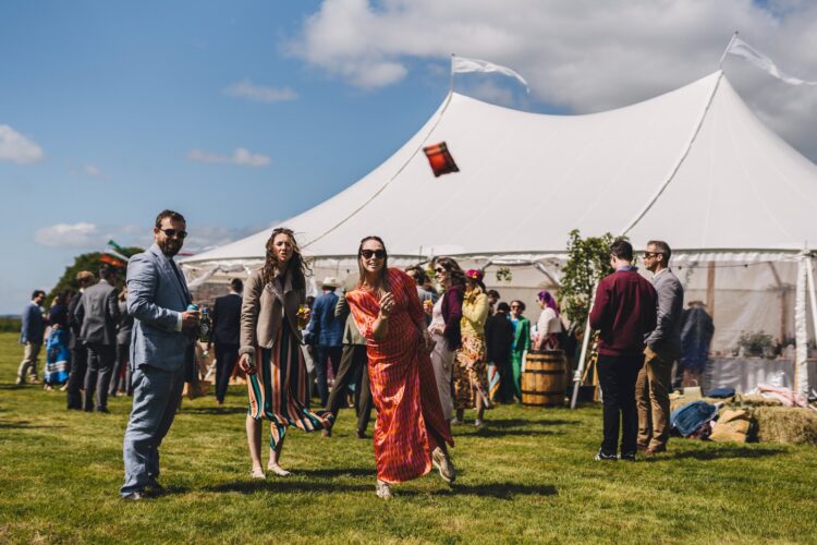 garden games and guests having fun during wedding reception LGBTQ wedding in the Black Mountains