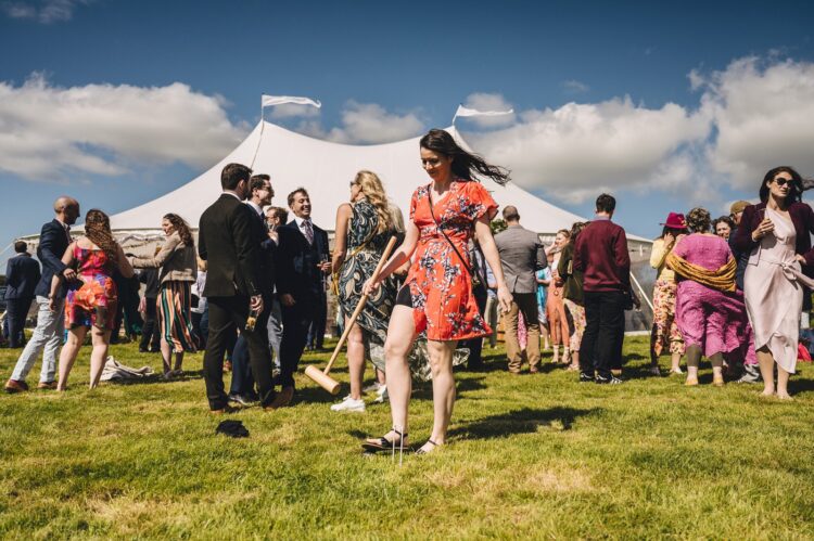 garden games and guests having fun during wedding reception LGBTQ wedding in the Black Mountains