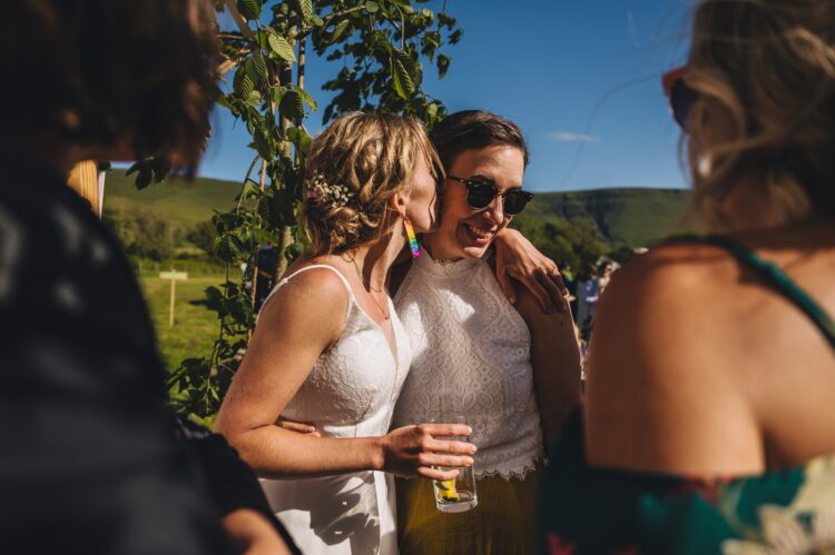 garden games and guests having fun during wedding reception LGBTQ wedding in the Black Mountains