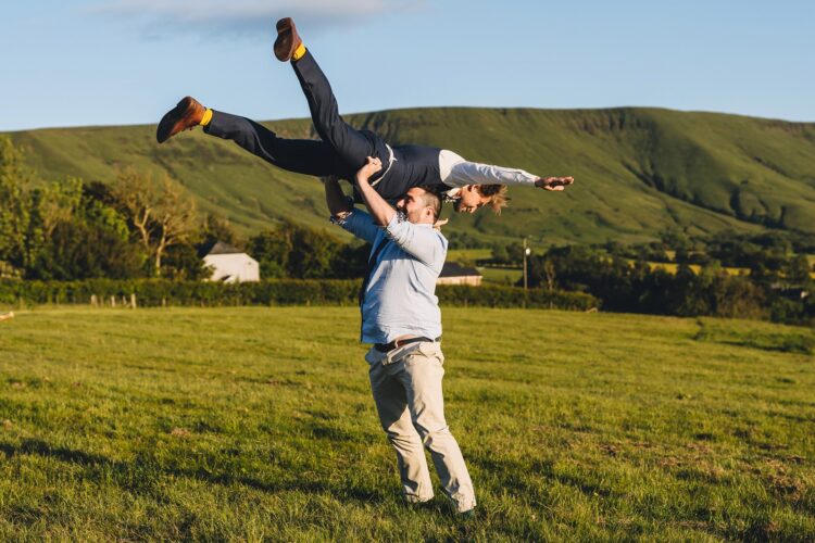 garden games and guests having fun during wedding reception LGBTQ wedding in the Black Mountains