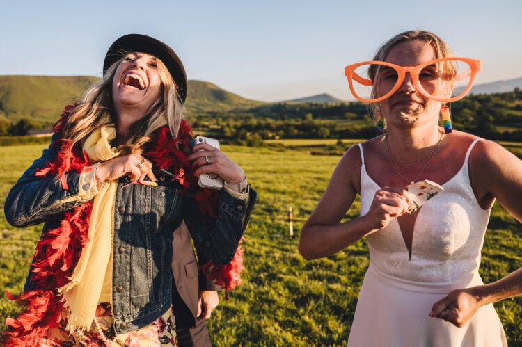 garden games and guests having fun during wedding reception LGBTQ wedding in the Black Mountains