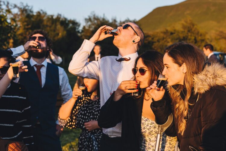 garden games and guests having fun during wedding reception LGBTQ wedding in the Black Mountains