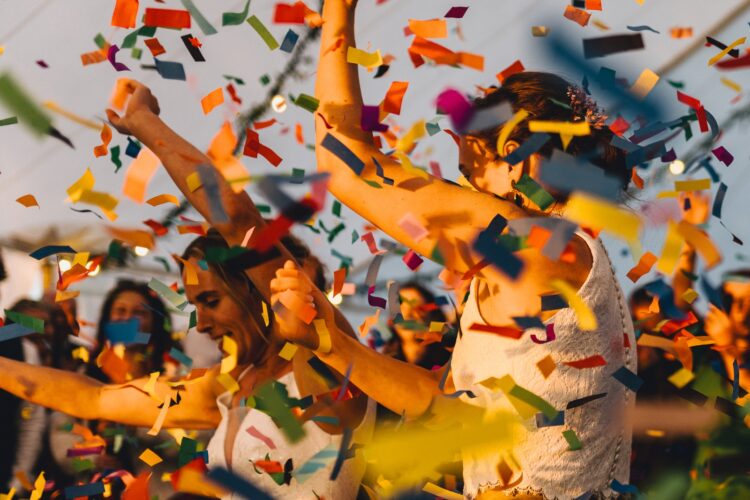 LGBTQ wedding photographer brides having the first dance in the golden hour
