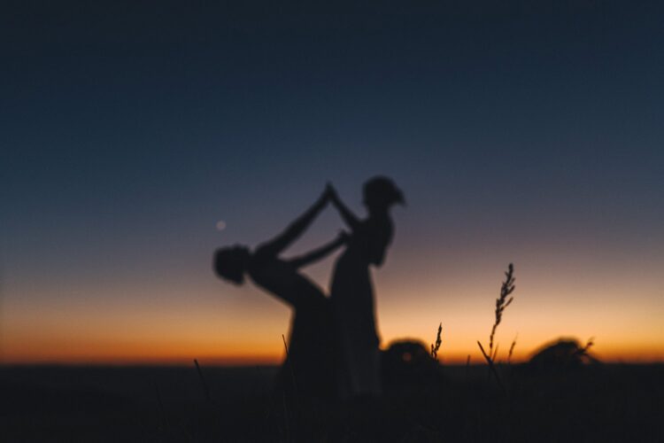 LGBTQ wedding photographer two brides in the blue hour radiating happiness and love