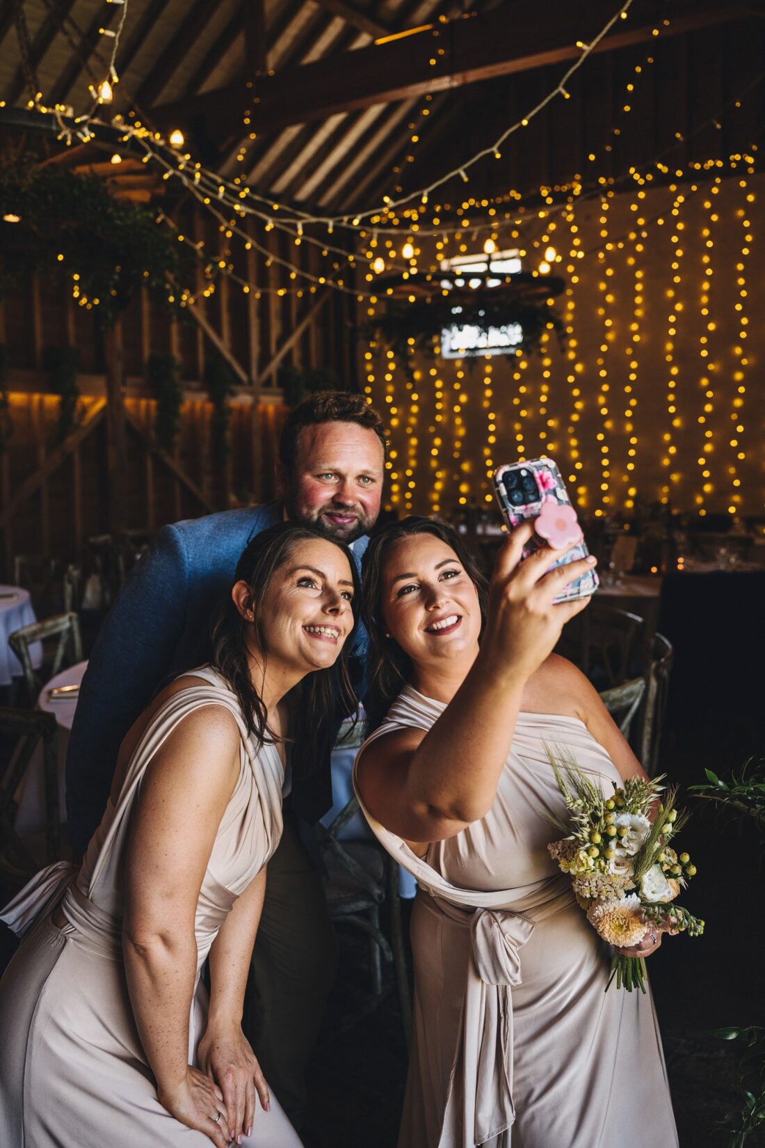 reception drinks and guests having fun at Over Barn