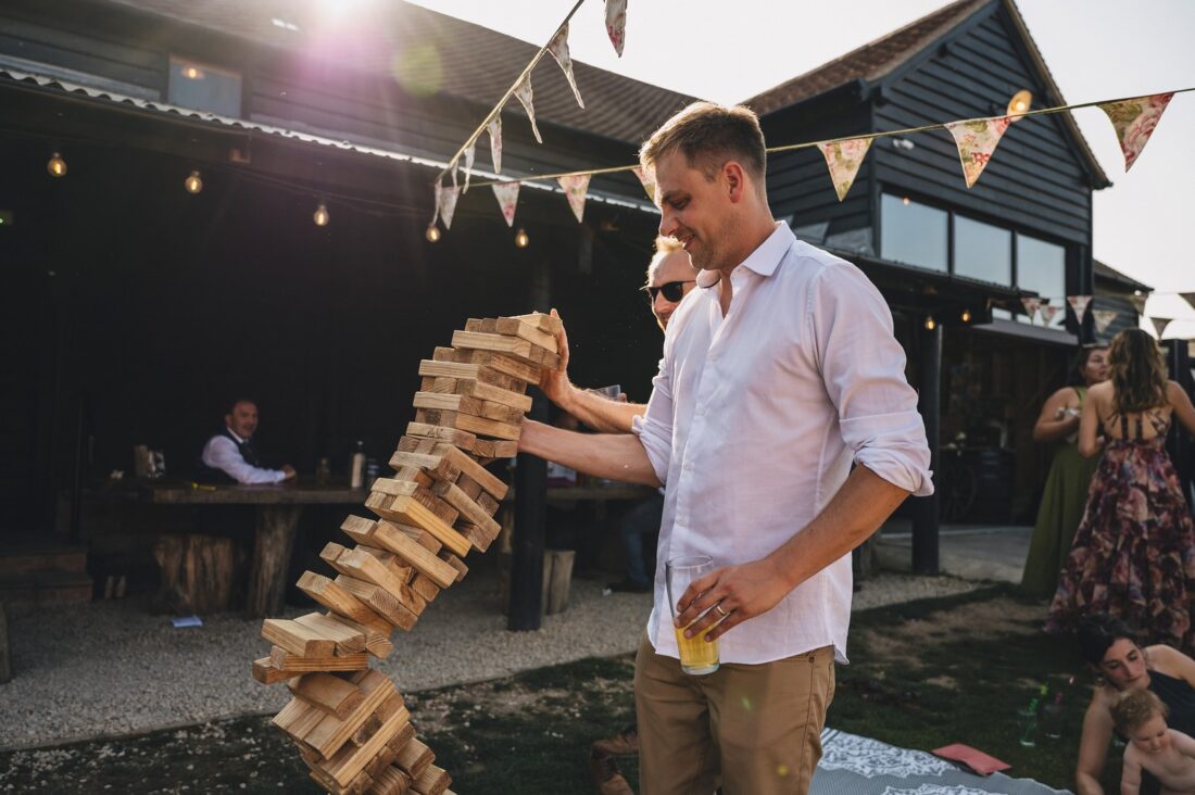 reception drinks and guests having fun at Over Barn