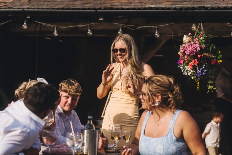 reception drinks and guests having fun at Over Barn