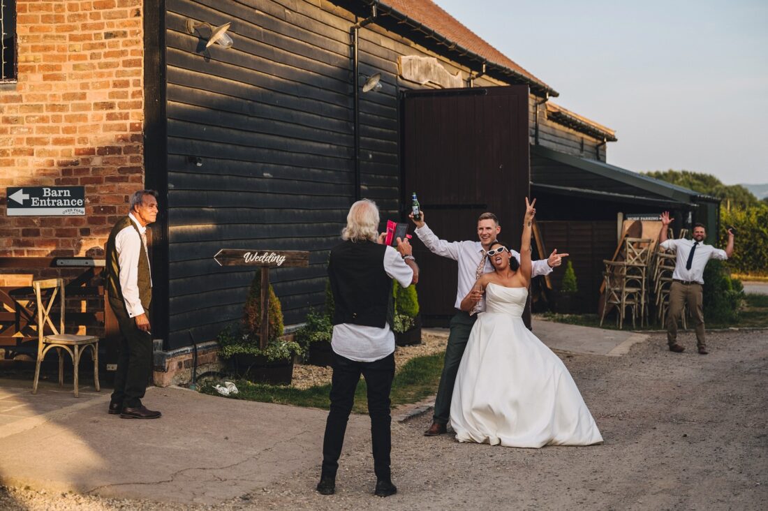 reception drinks and guests having fun at Over Barn