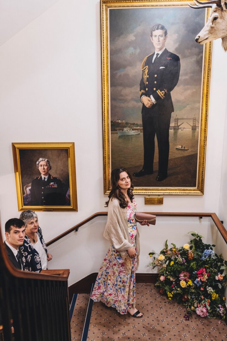 wedding guests ariving at the army and navy club pall mall london
