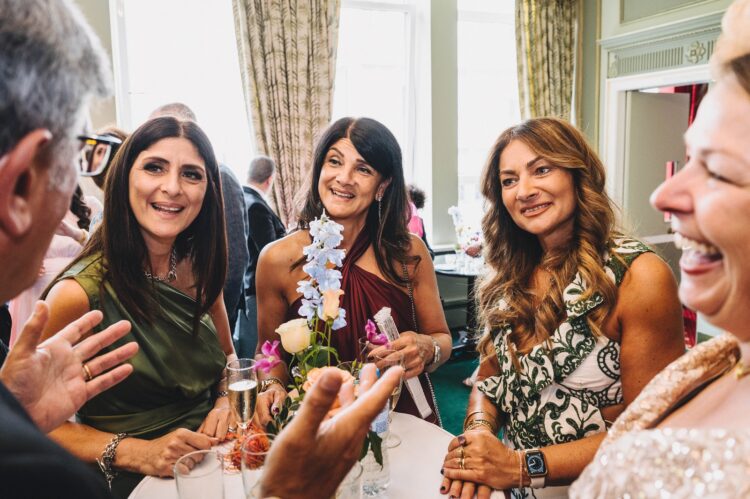 wedding guests at the army and navy club on Pall Mall London