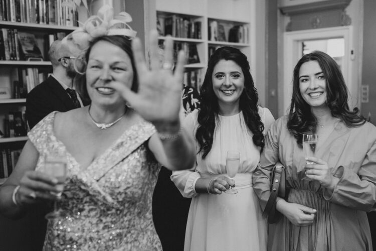 wedding guests at the army and navy club on Pall Mall London