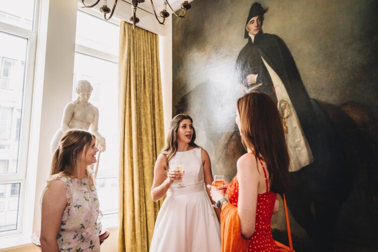 wedding guests at the army and navy club on Pall Mall London