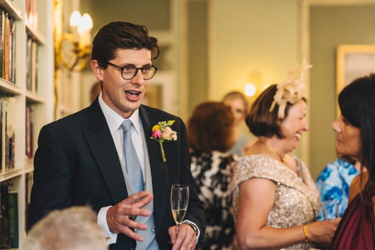 wedding guests at the army and navy club on Pall Mall London