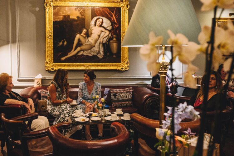evening conversations wedding guests at the army and navy club on pall mall london