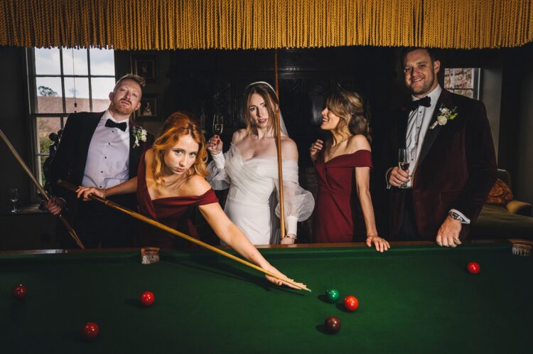 wedding fun during reception drinks at Dewsall Court