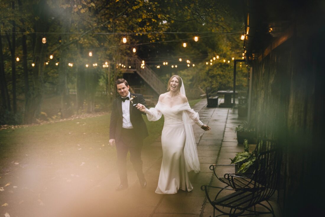 bride and groom at Dewsall Court jewish wedding photographer UK