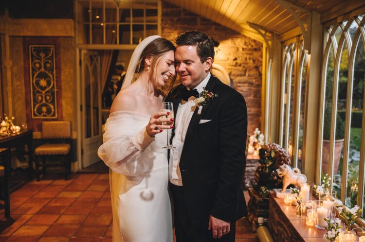 bride and groom at Dewsall Court jewish wedding photographer UK
