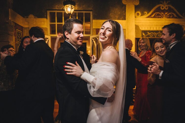 wedding fun during reception drinks at Dewsall Court