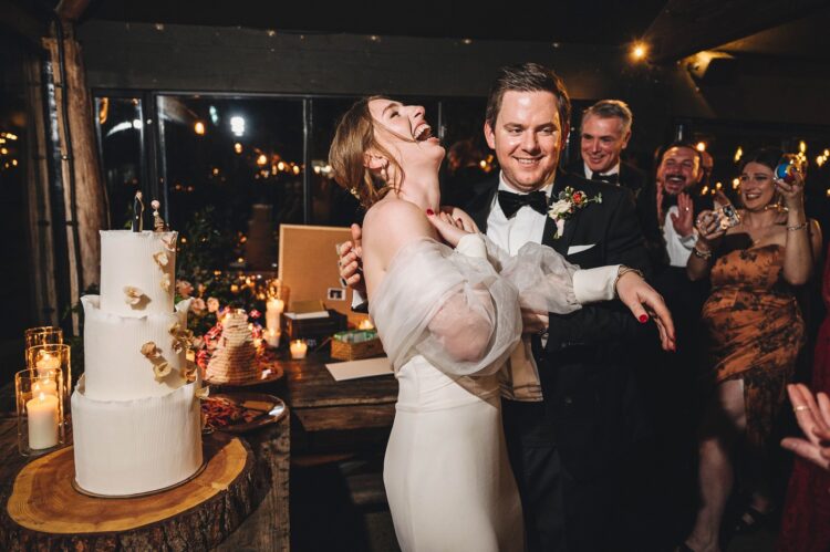 bride and groom cutting cake and dancing jewish wedding photographer