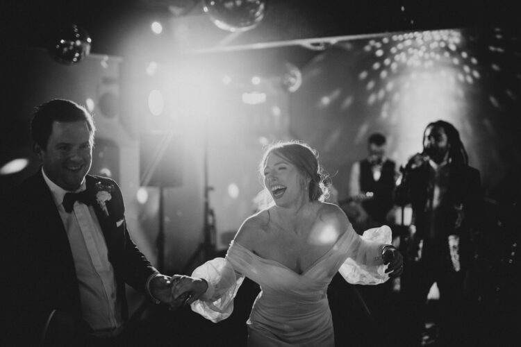 bride and groom first dance at Dewsall Court jewish wedding photographer