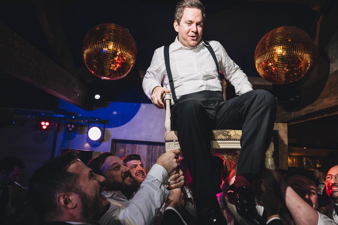 dance floor fun at Dewsall Court, jewish wedding photographer UK