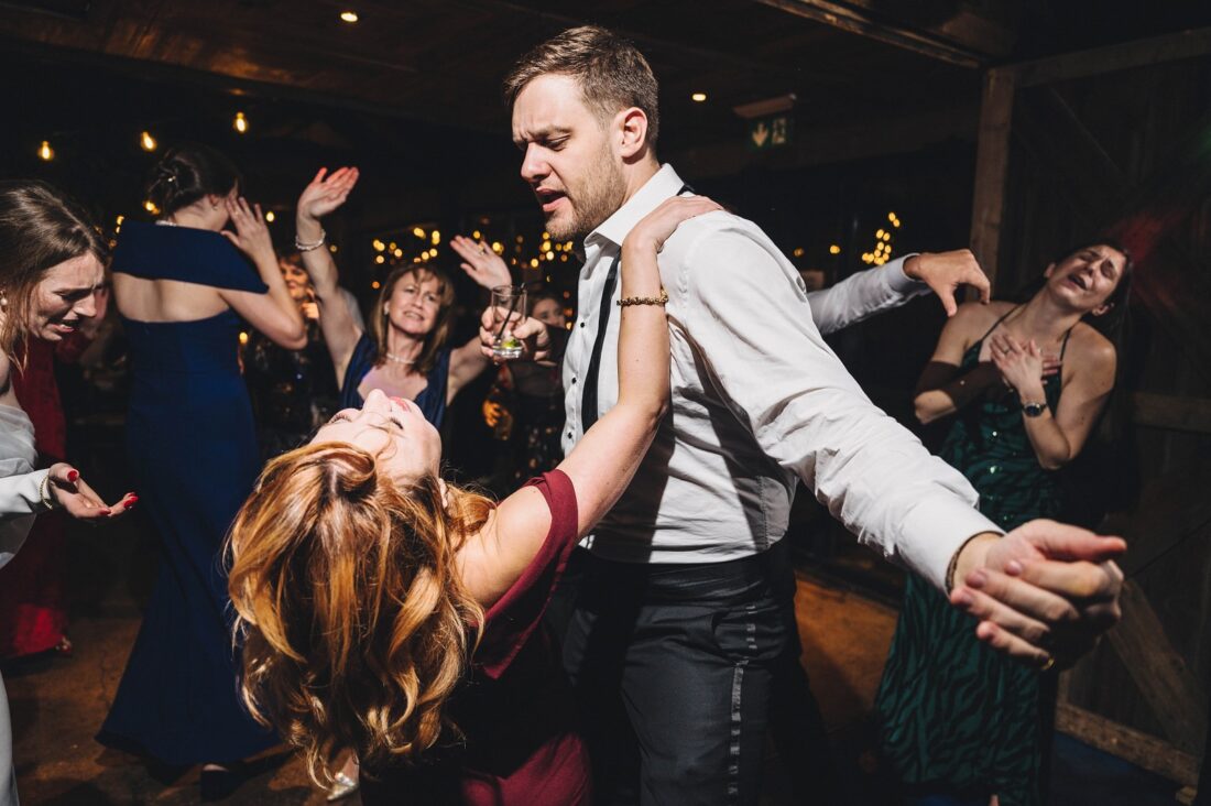 dance floor fun at Dewsall Court, jewish wedding photographer UK, dance floor wedding photography