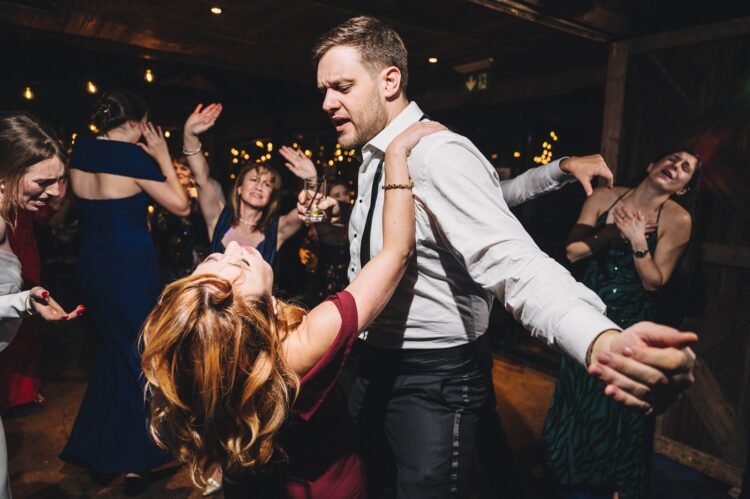 dance floor fun at Dewsall Court, jewish wedding photographer UK