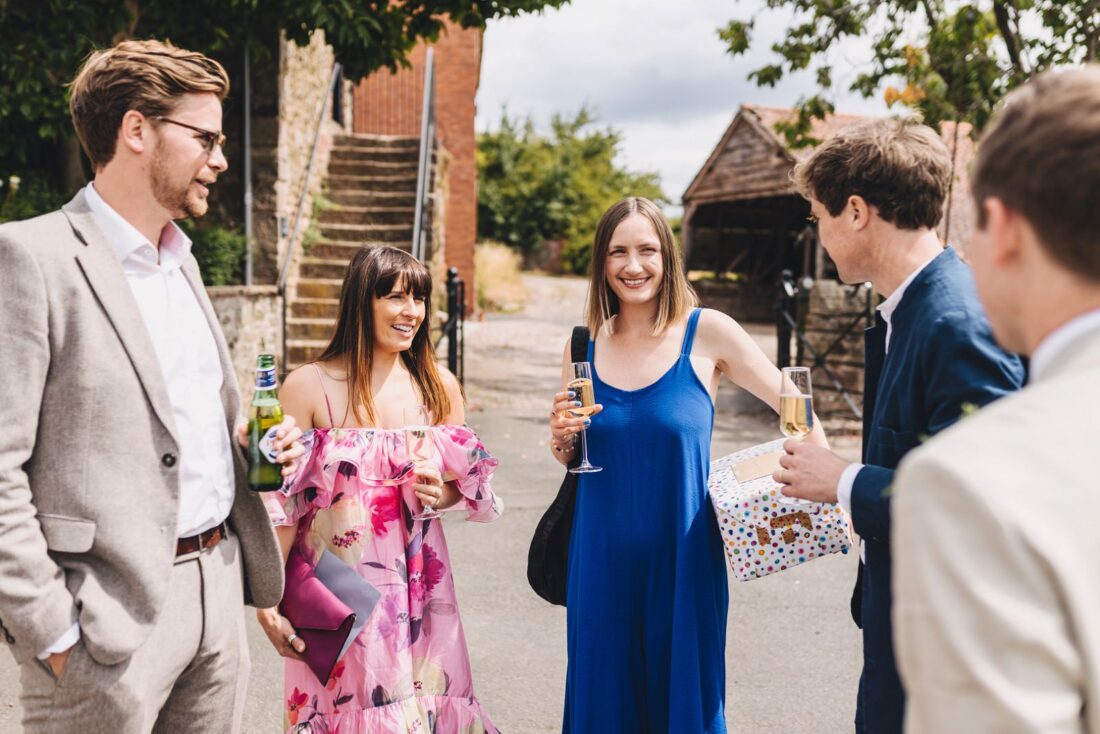 wedding guests arriving at Shucknall Court wedding venue Hereford