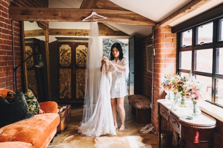bride getting ready at Shucknall Court Hereford