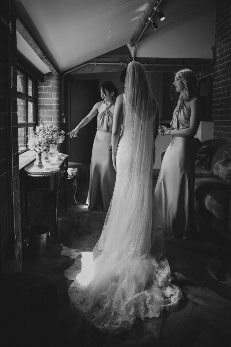 bride getting ready at Shucknall Court Hereford