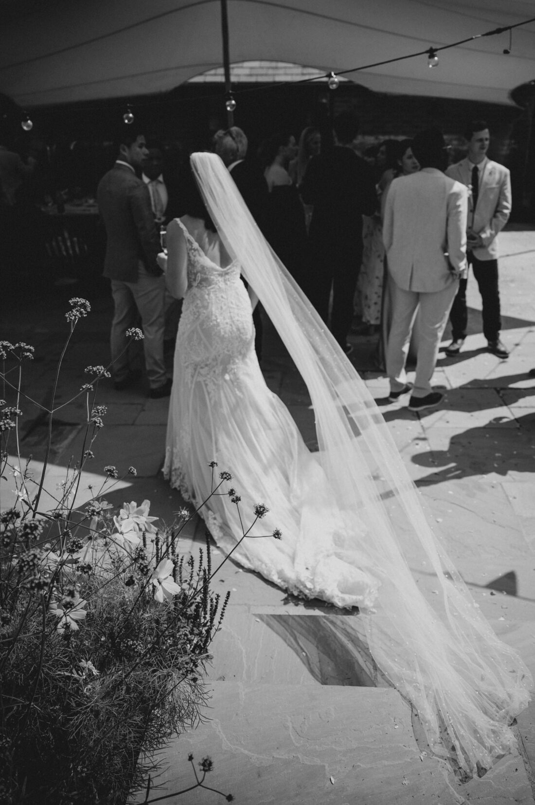 bride during reception drinks at Shucknall Court wedding venue hereford