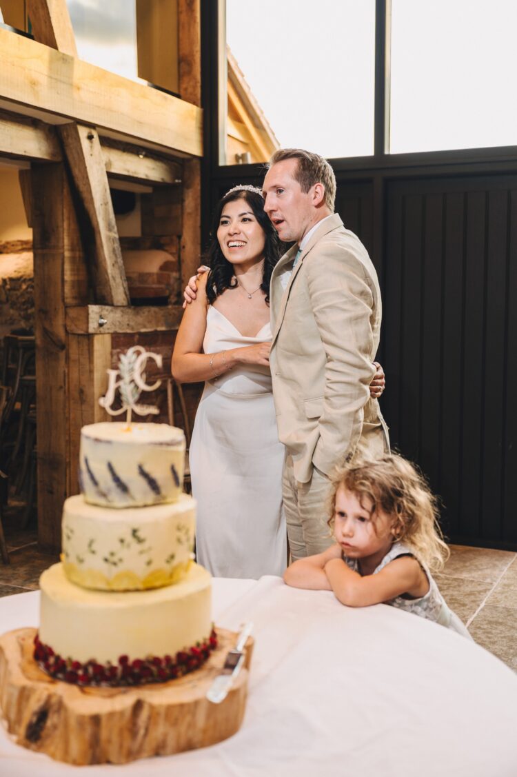 cake cutting at Shucknall Court, Herefordshire luxury wedding venue