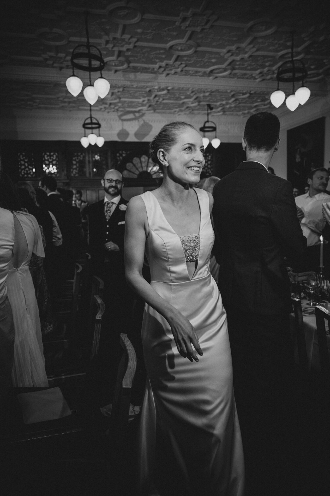 bride arriving at a wedding breakfast at Madingley Hall, Cambridge wedding photographer