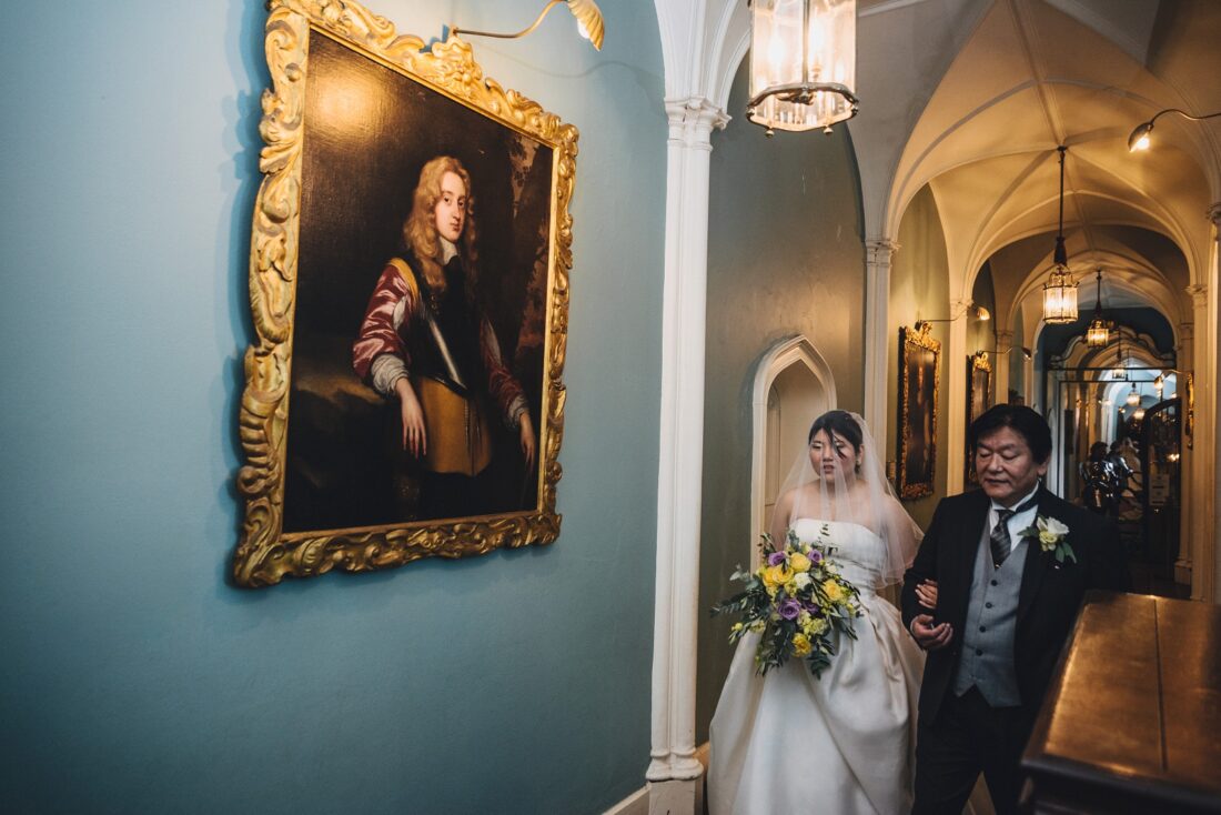 bride on the way to the ceremony at Warwick Castle, Warwick Castle wedding photographer