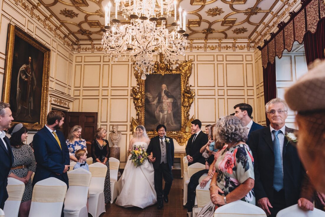 bride on the way to the ceremony at Warwick Castle, Warwick Castle wedding photographer