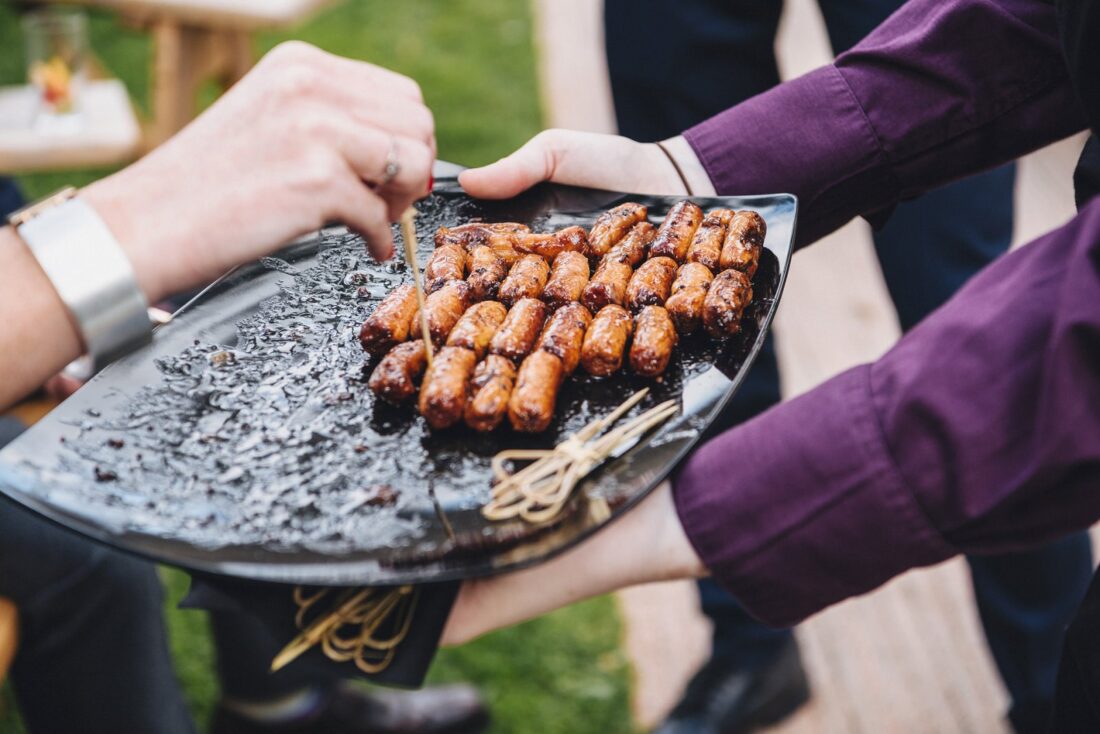 wedding guests enjoying food at Redbank Barn hereford