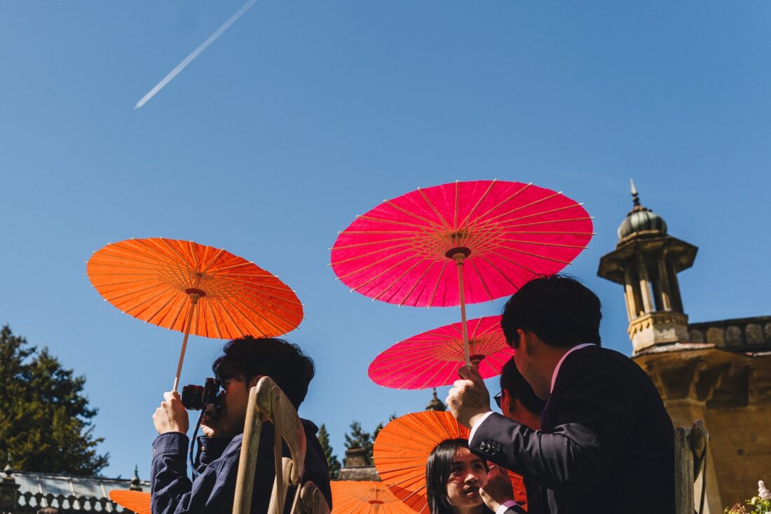 wedding guests during ceremony at sezincote house