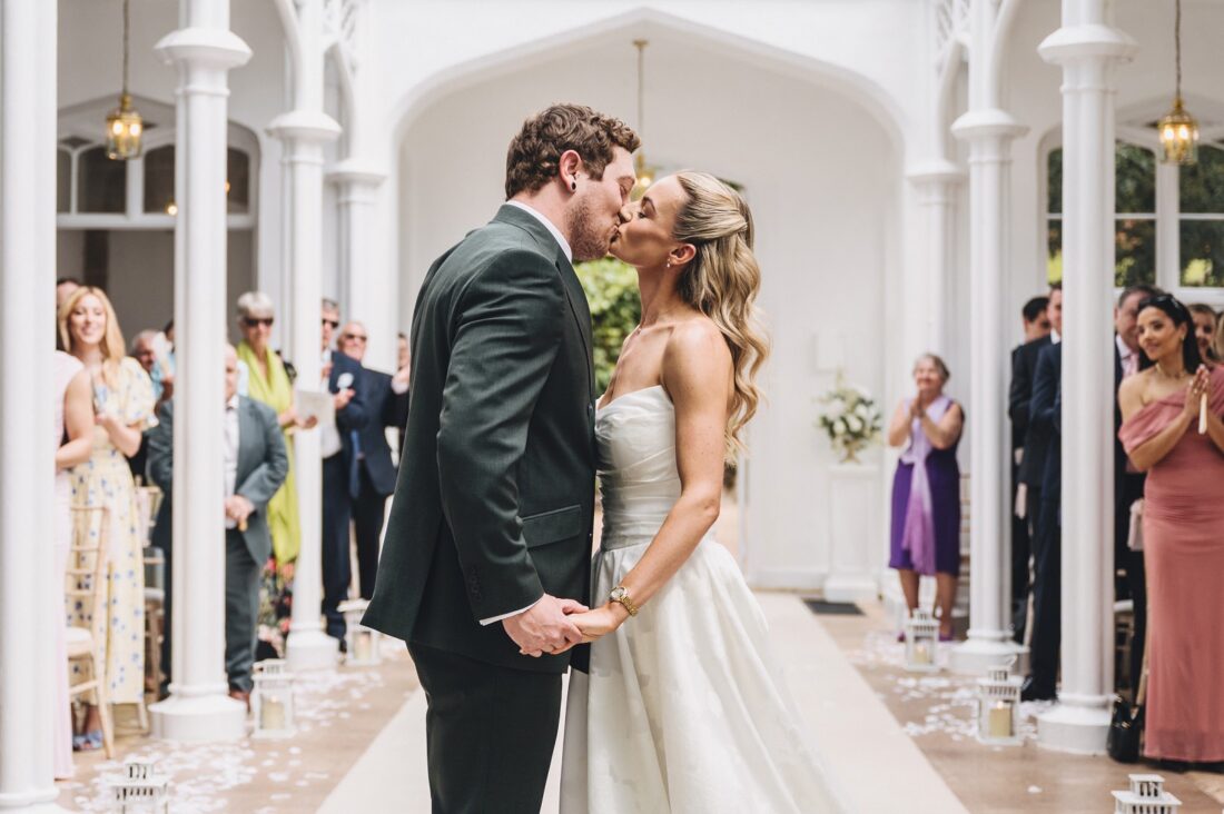 st audries park wedding photography the first kiss